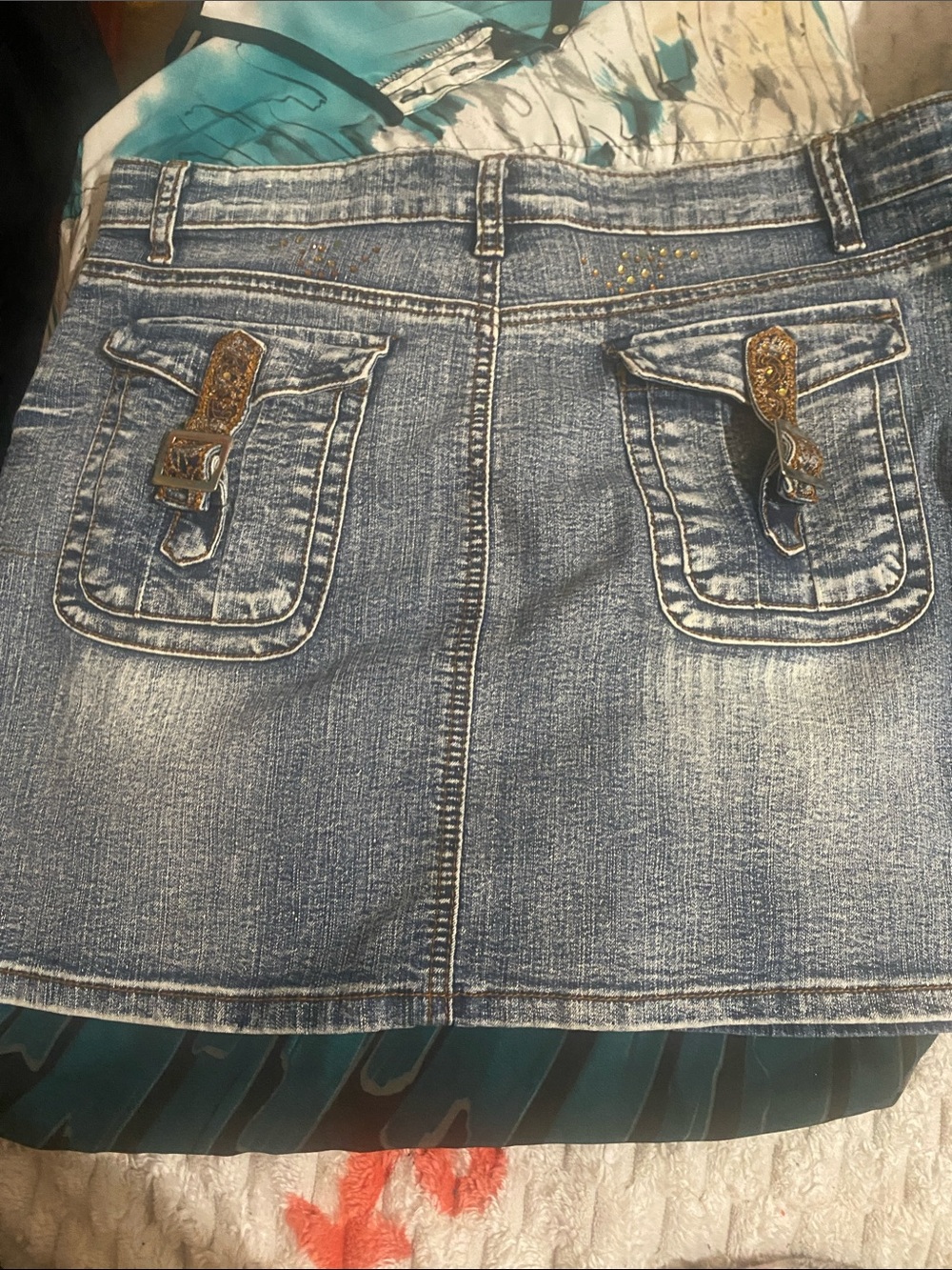 Light Blue Distressed Denim Mini Skirt with Buckle Flap Pockets